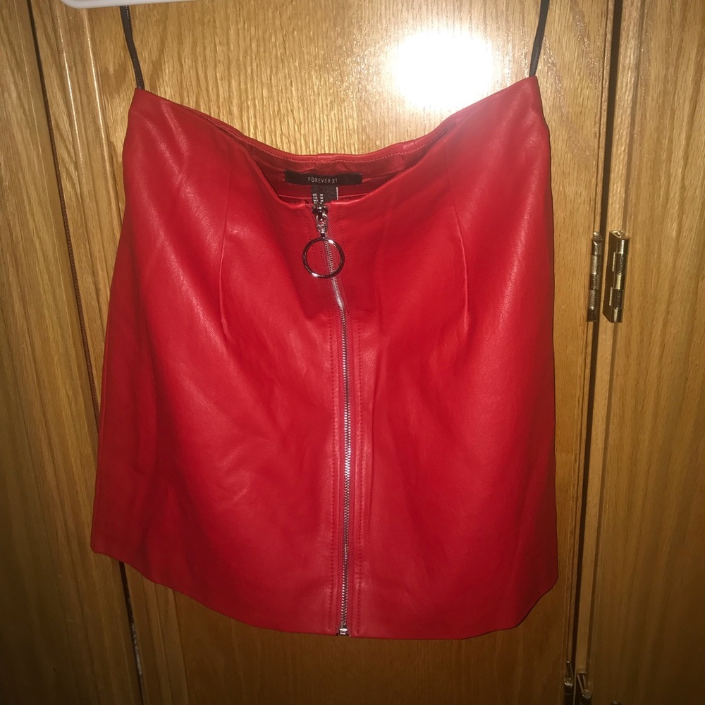 Bright red leather skirt